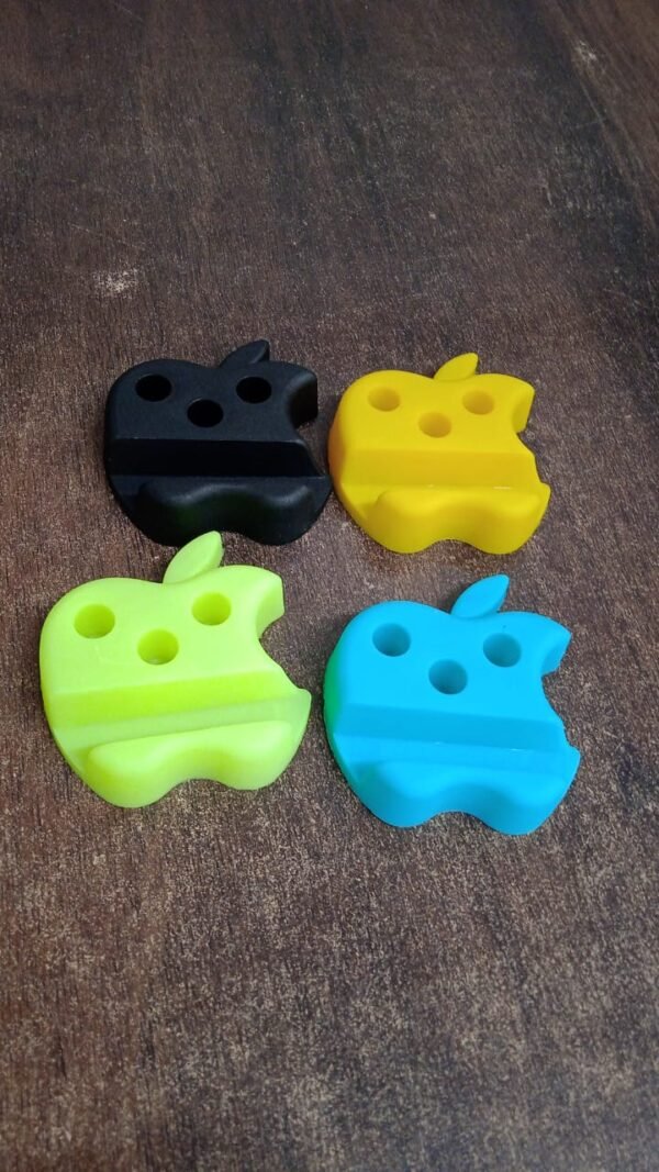 98f7de50-4d10-4754-8aa7-70086897bbd2.jpg Multi-Functional Apple-Shaped Plastic Mobile Stand with Pen Holder (1 Pc / Mix Color)