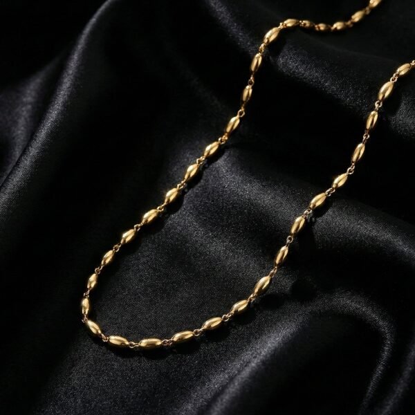 Necklace-03_e53f0790-d56b-4c31-8d0b-487b9efdc5b7.jpg Elegant Gold-Tone Oval Bead Necklace Chain for Women (1 Pc)