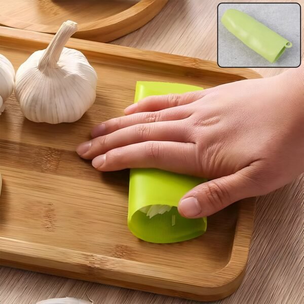 Silicone-Garlic-Peeler-Tube-04.jpg Silicone Garlic Peeler Tube Easy Hand Roller Peeling Tool (1 Pc)