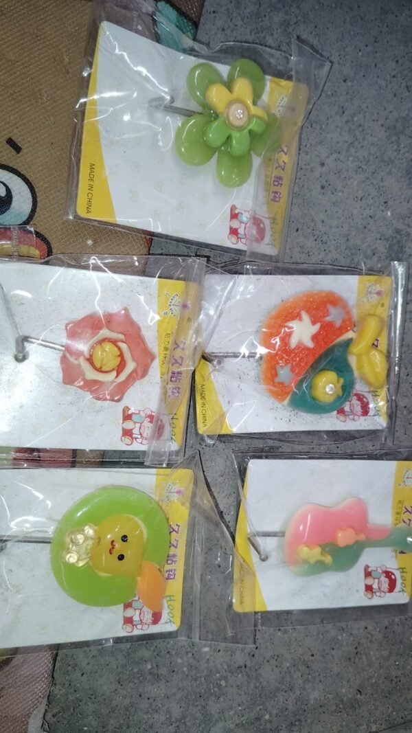 a2546704-f91d-4069-b9c4-f7c854df7ea4.jpg Multipurpose Strong Hook Self-Adhesive hooks (1 Pc / Mix Design)