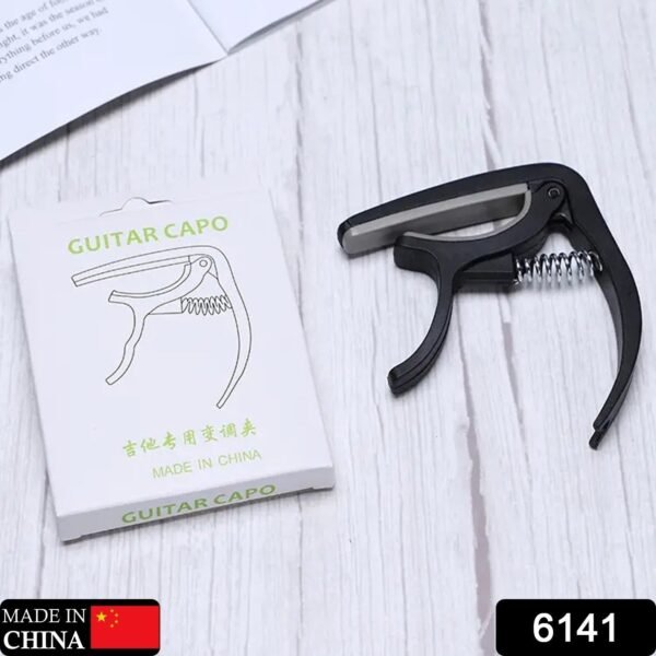 b7a1c5b1-3683-420b-8ef4-8fd59d187be0_35ad7b22-f449-4c44-9c75-b511428a1598.jpg Guitar Capo with Pickup Stand – Soft Capo for Acoustic & Electric Instruments
