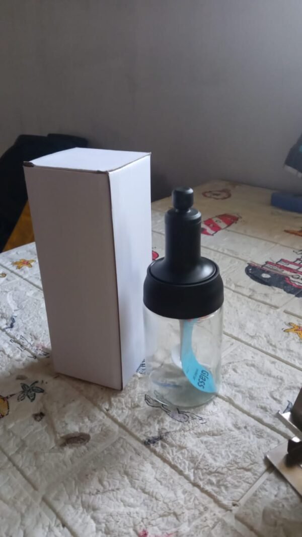 ce111426-727b-4917-8ad4-c8a084273e4c.jpg All-in-One Seasoning Jar: Heat-Resistant Glass with Spoon (1 Pc)