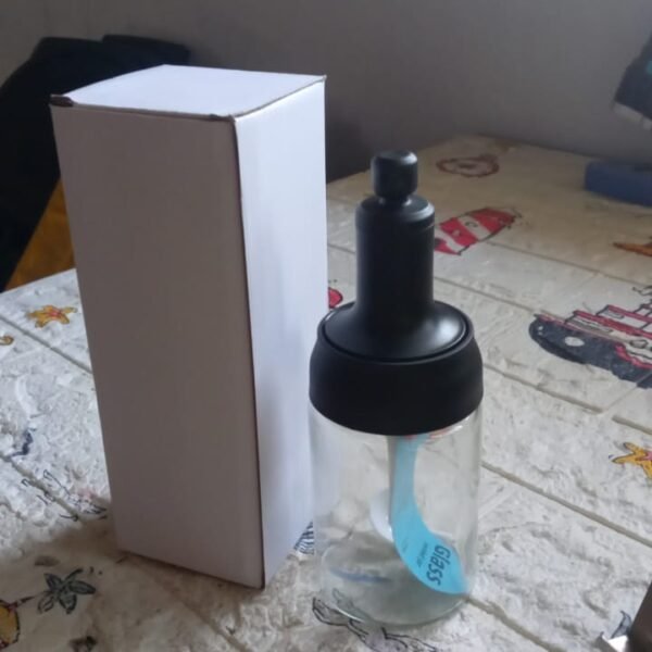 ce111426-727b-4917-8ad4-c8a084273e4c.jpg All-in-One Seasoning Jar: Heat-Resistant Glass with Spoon (1 Pc)