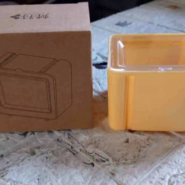 cfddc5d1-26f7-45c5-9b90-98f08ae29fae.jpg Durable Transparent Tape Storage Box – Plastic Office Organizer