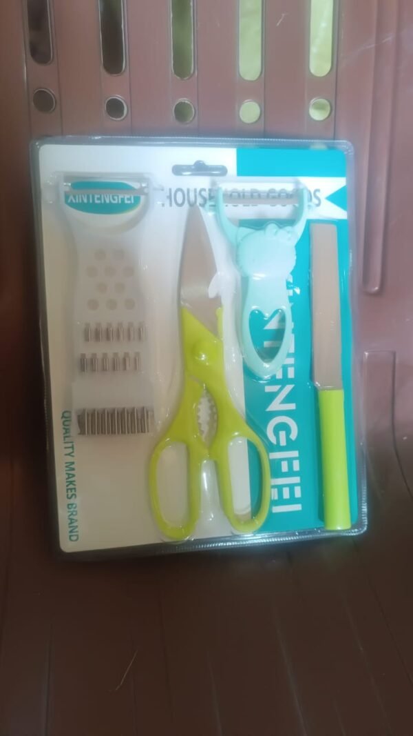 d92e092d-a9cf-42ae-b0c4-36c3069b1f8e.jpg 4-Piece Kitchen Cutting Set: Scissors, Peeler, Grater / Slicer, and Knife