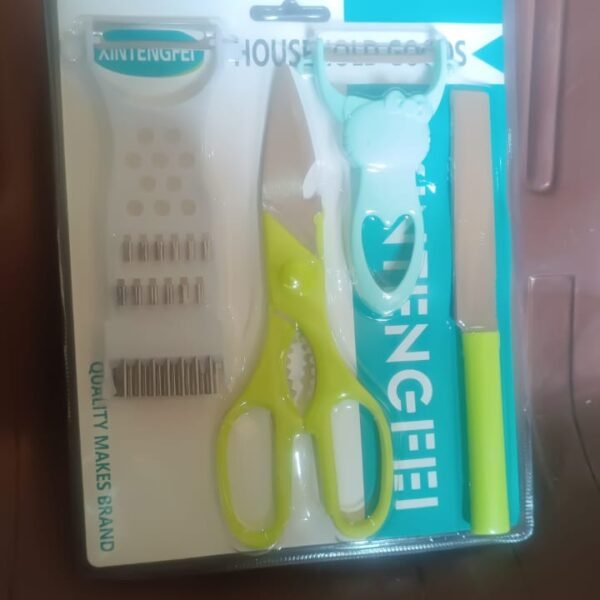 d92e092d-a9cf-42ae-b0c4-36c3069b1f8e.jpg 4-Piece Kitchen Cutting Set: Scissors, Peeler, Grater / Slicer, and Knife