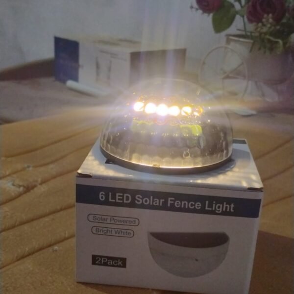 e24847aa-53d0-4707-beb9-eca24c65ec86_8255890c-88d5-41b8-9eef-0fe28cdd4eba.jpg 6 LED Solar Powered Wall Mount Fence Light with Honeycomb Shade Design (2 Pc Set)